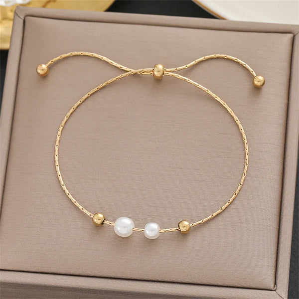 Pearl gold chain bracelet