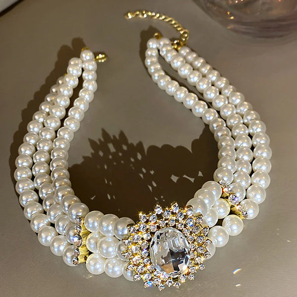 Pearl and diamond pendant